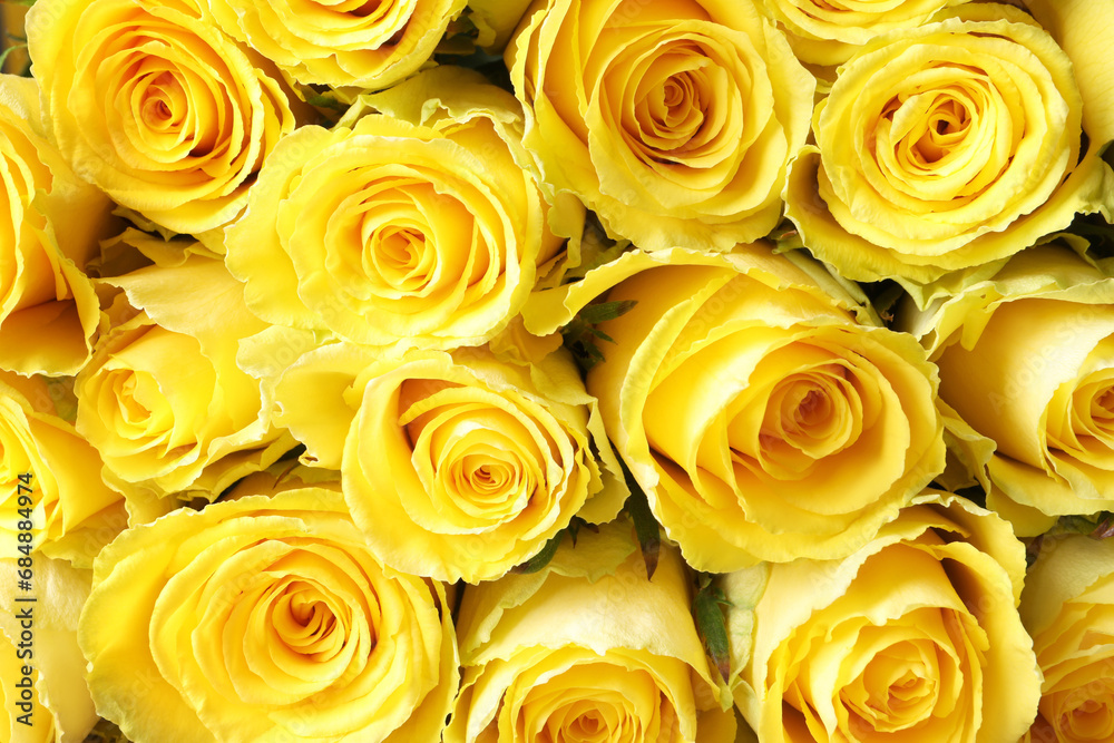 Beautiful bouquet of yellow roses as background, top view Beautiful bouquet of yellow roses as background, top view