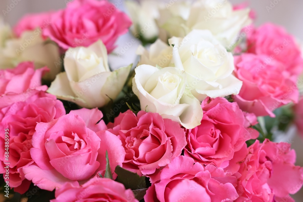 Beautiful bouquet of roses on blurred background, closeup Beautiful bouquet of roses on blurred background, closeup