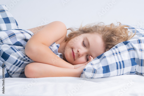 Картината върху платно Healthy sleep. Kid sleeps on bed, napping. Cute child sleeping.