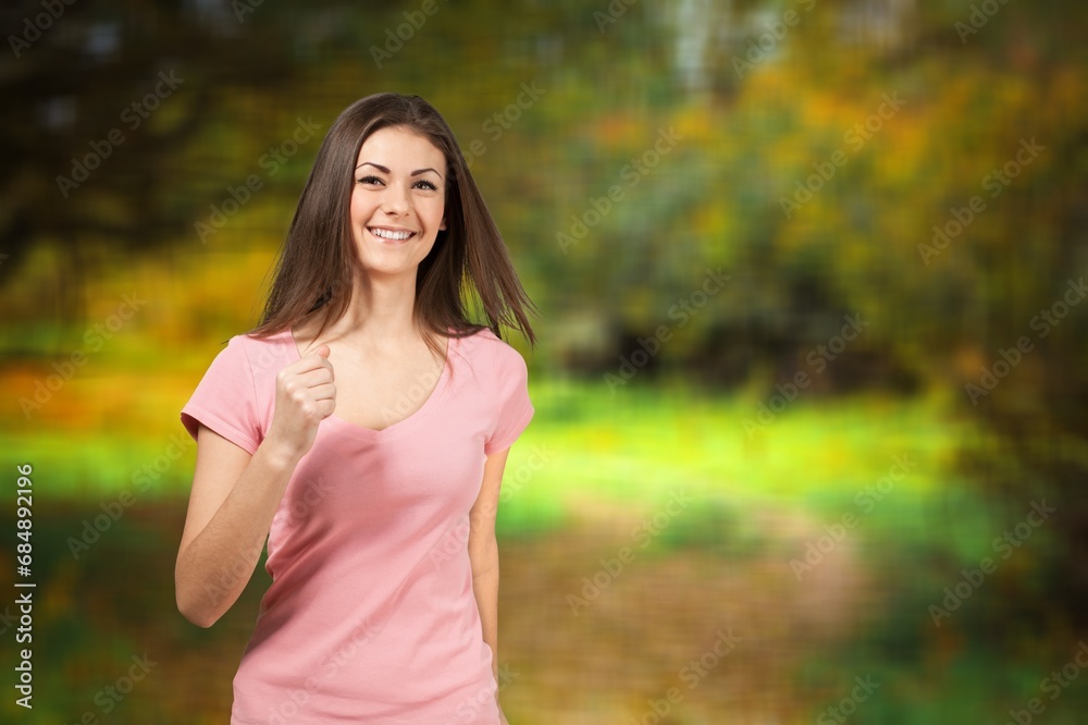 Hello autumn. happy woman running in the park Hello autumn. happy woman running in the park