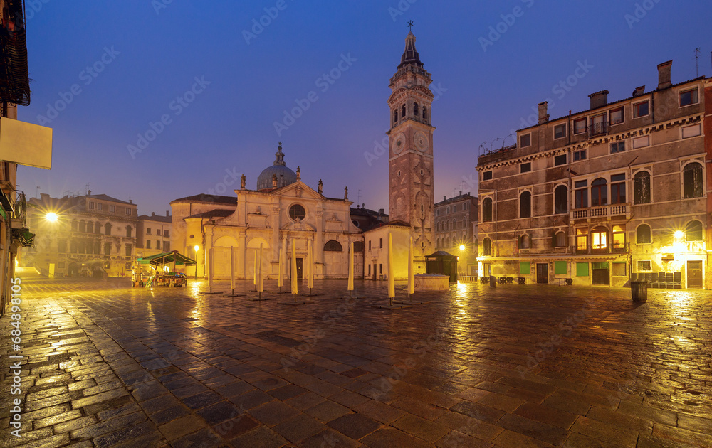 Piazza Santi Giovanni e Paolo illuminated at night at dawn. Venice.