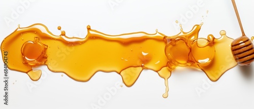 top view of Spilled fresh sweet honey isolated on white background. 