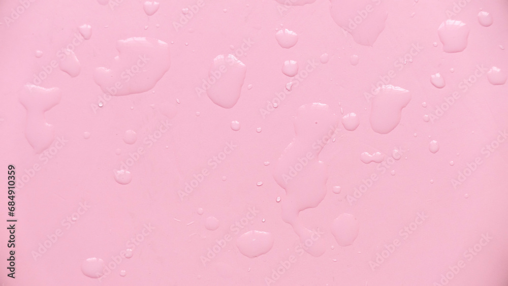 Water drops over a pink background for creative poster design. Water drops over a pink background for creative poster design.