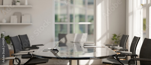Front view of a meeting table in a modern  contemporary meeting room. Boardroom  place of work