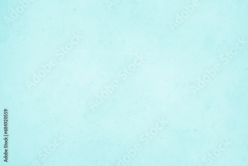 Pastel blue and white concrete stone texture for background in summer wallpaper. Cement and sand wall of tone vintage. Decorative abstract wall of light cyan color painted, Beautiful mint green decor. photo