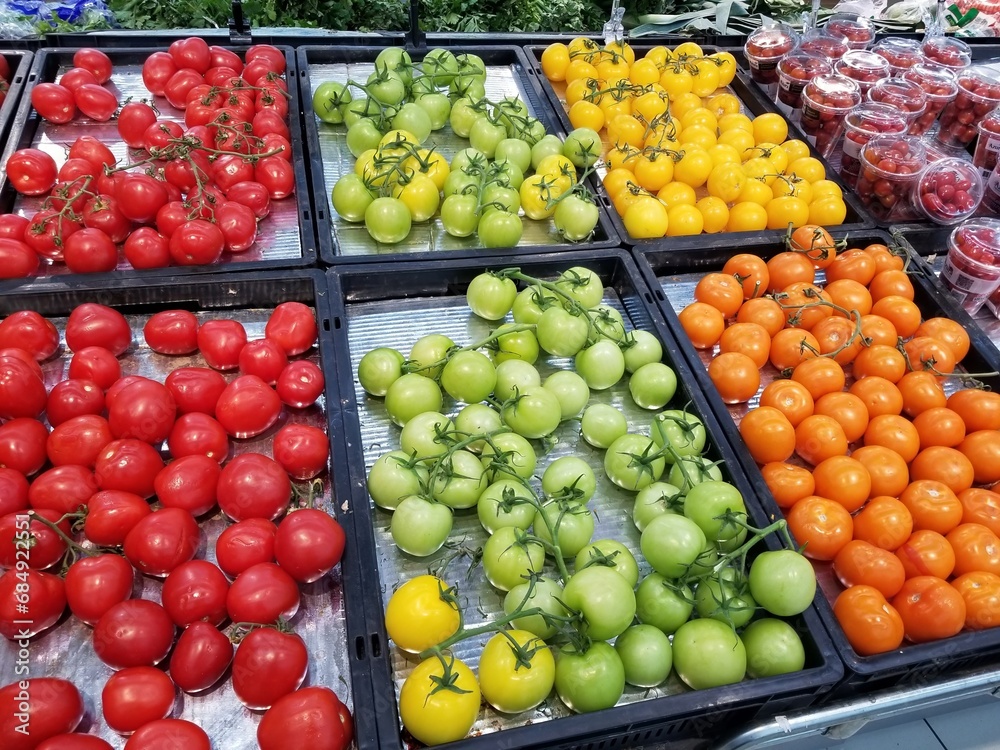 Varieties of tomatos on the fresh market stall Varieties of tomatos on the fresh market stall