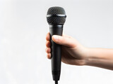 Hand holding microphone, singer right hand holding dynamic microphone, isolated on white background