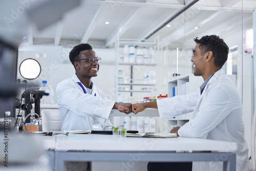 Smile, fist bump and men in laboratory for celebration, deal success or onboarding welcome. Teamwork, medical research and scientist in partnership, collaboration or introduction for happy doctors. photo