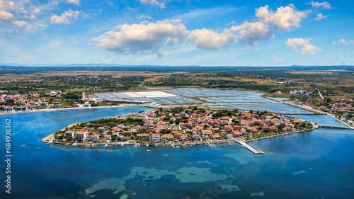 Historic town of Nin laguna aerial view with Velebit mountain background, Dalmatia region of Croatia. Aerial view of the famous Nin lagoon and medieval in Croatia