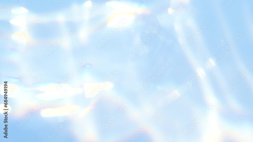 Blue abstract smooth bokeh light leak, water blurred motion, sunlight lens flare