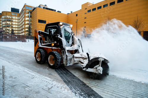 Snow removal with a loader.