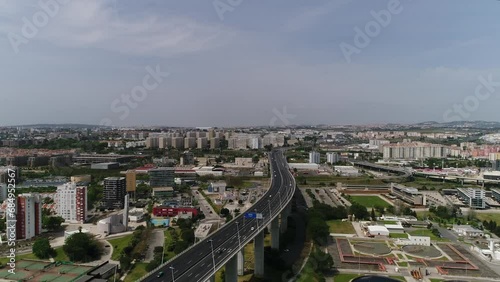 Flying Over Vasco da Gama Bridge and City of Sacavém, Portugal photo