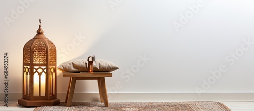 In a beautifully lit room, an isolated wooden furniture piece stands against a white background, adorned with a book on Islam, symbolizing the concept of Ramadan Kareem in Turkey. Arabic words grace photo