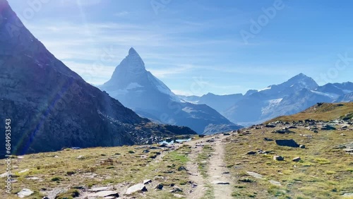 Mountain Freedom: Matterhorn Mountain Landscape Near Rotenboden and Gornergart, Switzerland, Europe | Walking Remote Path Near Stone Hillside photo