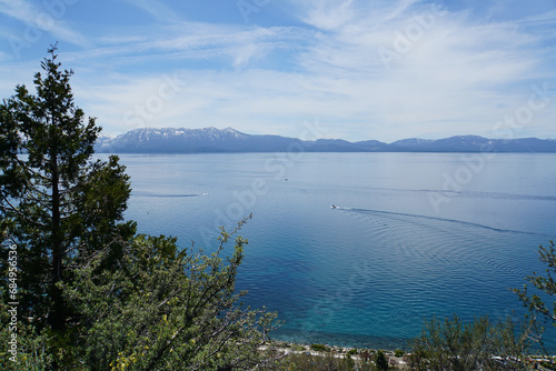 Scenic view of mountains and forested coastline of the East Shore of Lake Tahoe from the top of Cave Rock, Nevada 