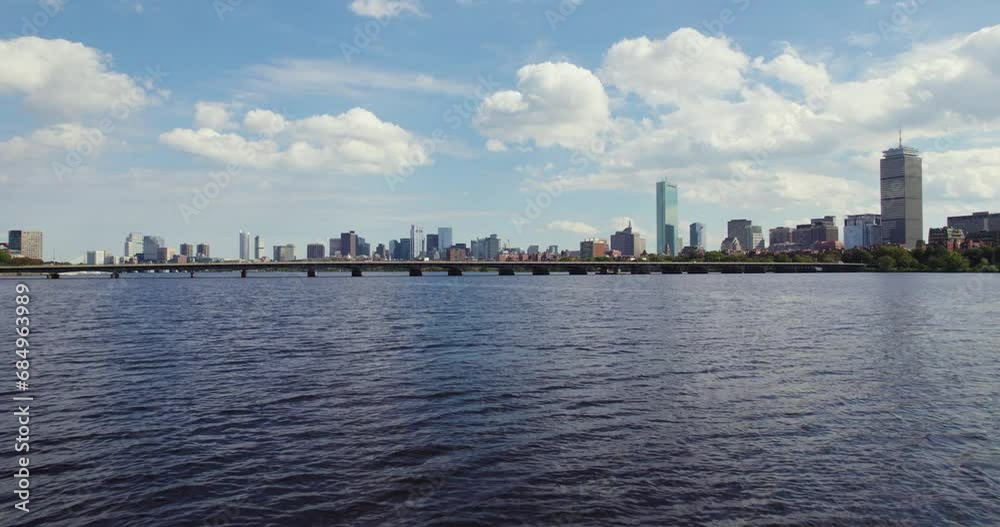 Aerial fly over Charles river toward Harvard bridge, Boston city skyline Aerial fly over Charles river toward Harvard bridge, Boston city skyline