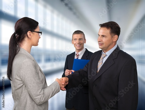 Bussiness people team shaking hands at meeting