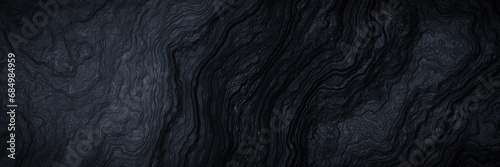 Abstract black cooled lava. Black volcanic rock background. photo