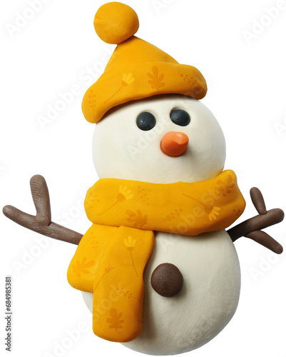 Modeling clay snowman. Cute snowman in an orange hat and scarf.