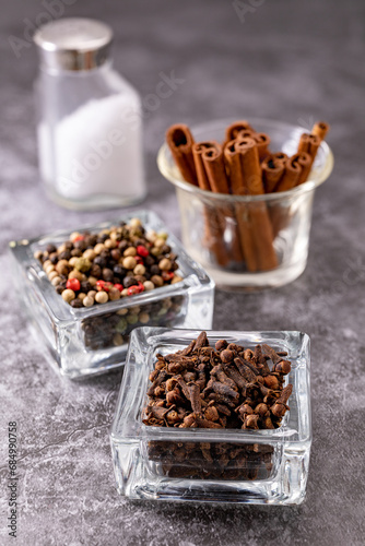 Pepper, cinnamon and clove spices isolated