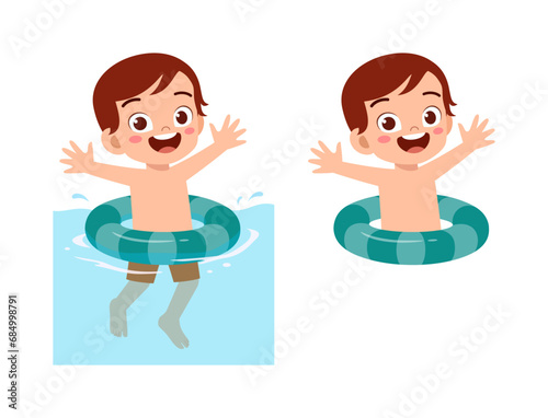 little kid using swim ring for swimming