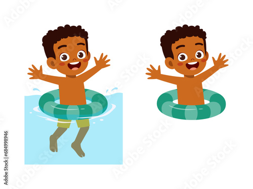 little kid using swim ring for swimming