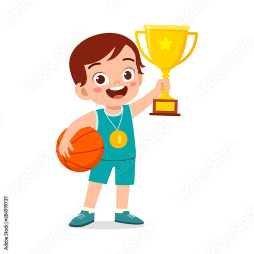 little kid holding trophy winning in sport