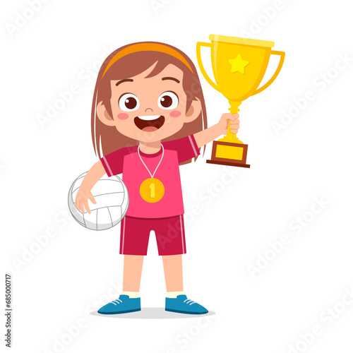 little kid holding trophy winning in sport
