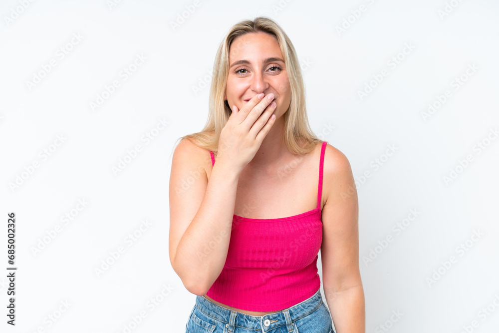 Young caucasian woman isolated on white background happy and smiling covering mouth with hand Young caucasian woman isolated on white background happy and smiling covering mouth with hand