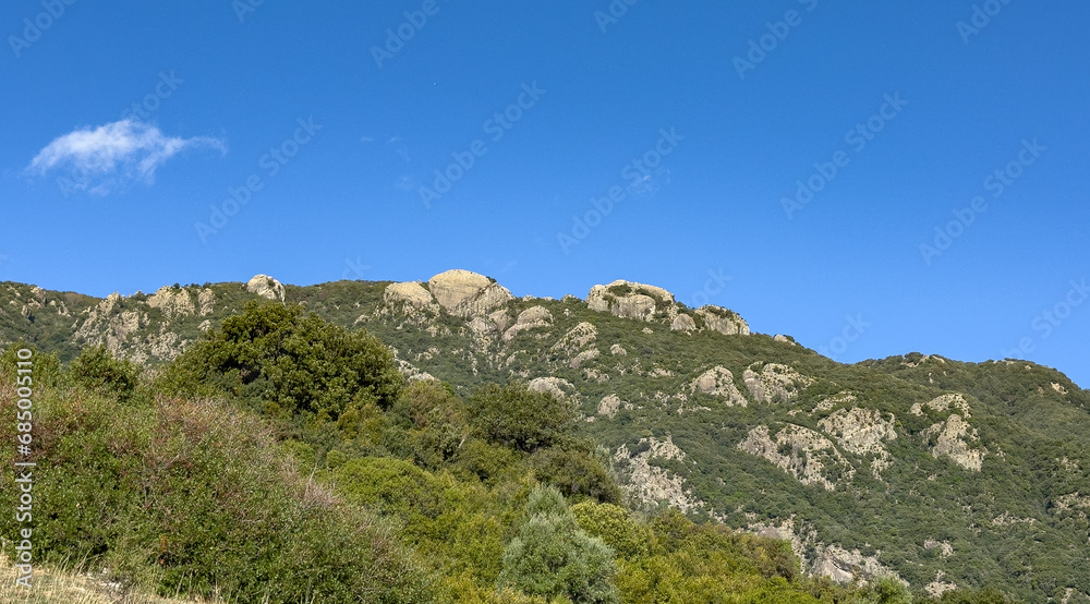 The mountainous massif called Rocche dell'agonia, in the Asprmonte national park The mountainous massif called Rocche dell'agonia, in the Asprmonte national park