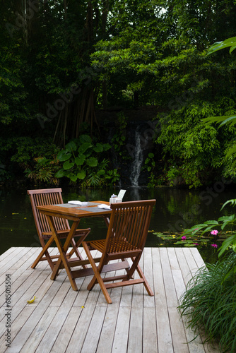 Table and chairs in the tropical surroundings