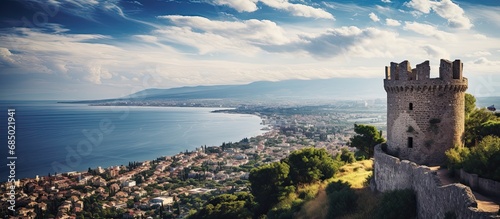 From the top of Kadifekale, a majestic castle overlooking Izmir's downtown, one can enjoy a breathtaking view of the sparkling sea and endless sky. photo