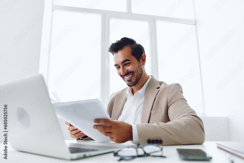 Document holding happy company office modern suit businessman laptop paper planning Document holding happy company office modern suit businessman laptop paper planning
