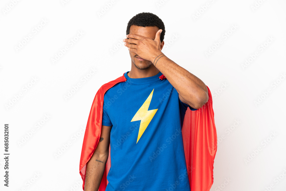 African American Super Hero man over isolated white background covering eyes by hands. Do not want to see something African American Super Hero man over isolated white background covering eyes by hands. Do not want to see something