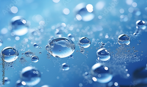  A close up of clear water drops on blue surface.