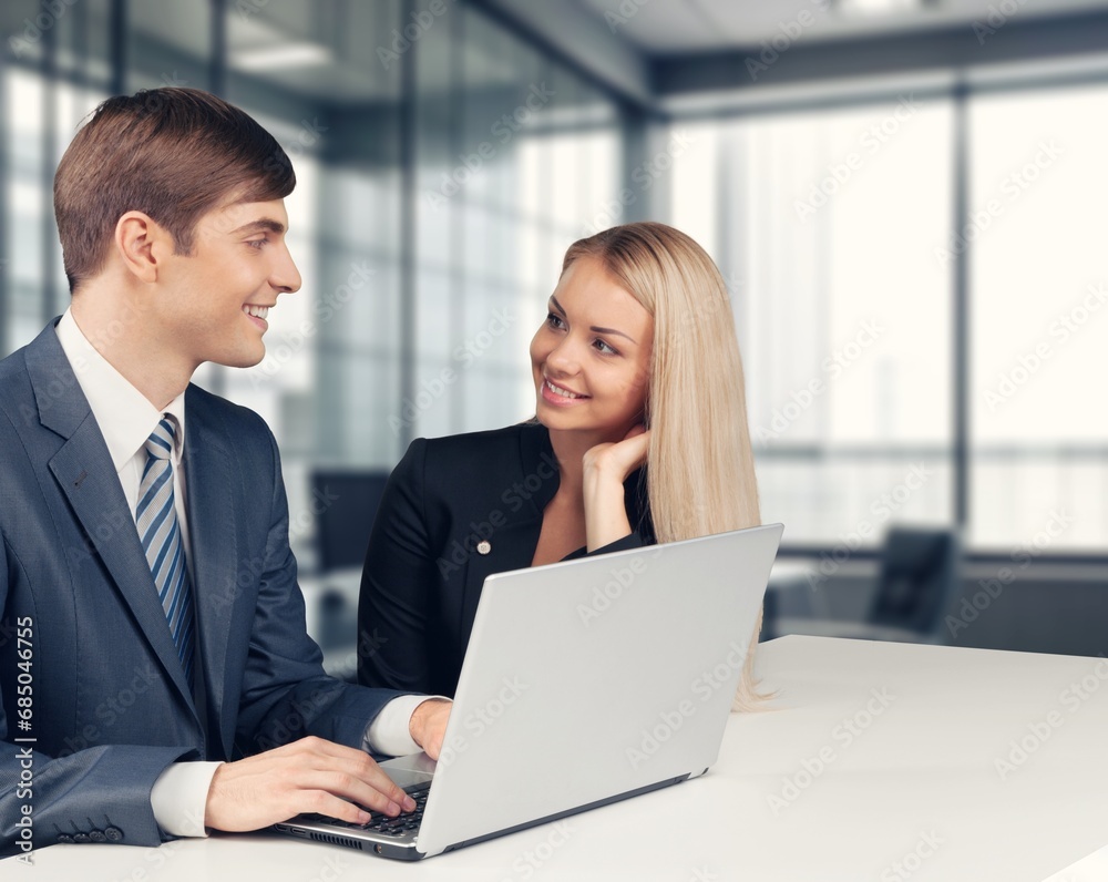 manager teaching young worker discussing strategy manager teaching young worker discussing strategy
