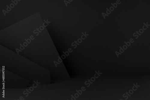 Exquisite black stage mockup with abstract geometric pattern of corners, angles, flat shapes, triangles as relief for presentation cosmetic products, goods, advertising, design in graphic style. photo