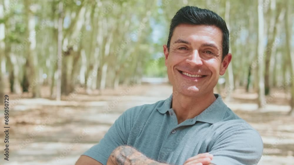 Close-up of middle-aged man looking at the camera with smile
