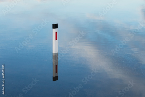 Flooded road blocking transport