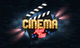 Movie time. Cinema banner or poster with neon signs, clapperboard and spotlights. Vector illustration.