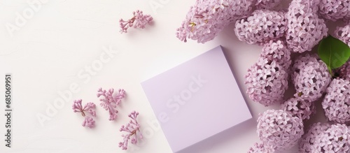 Lilac flowers and gift box ...