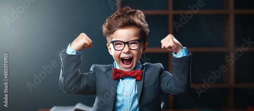 Joyful young student standi...