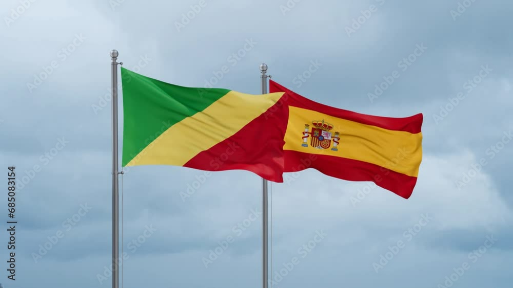 Spain and Congo-Brazzaville flag waving together on cloudy sky, endless seamless loop, two country cooperation concept Spain and Congo-Brazzaville flag waving together on cloudy sky, endless seamless loop, two country cooperation concept