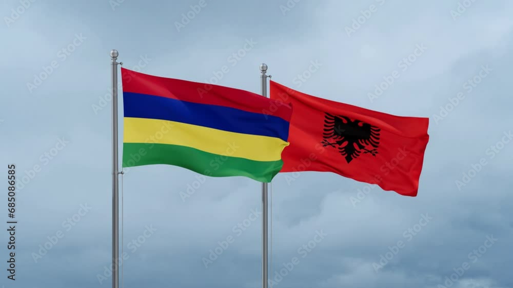 Mauritius flag and Albania flag waving together on cloudy sky, endless seamless loop