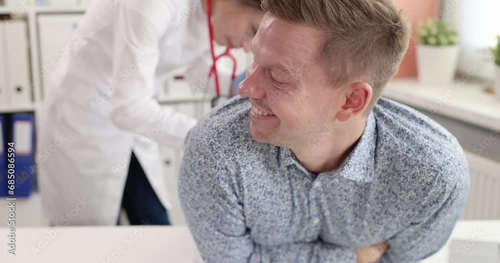 Young man at medical appointment with proctologist. Male problems with caves concept