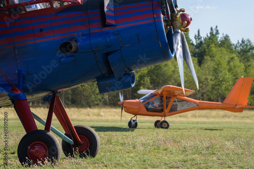 AIRPLANE - Biplane at a field airport