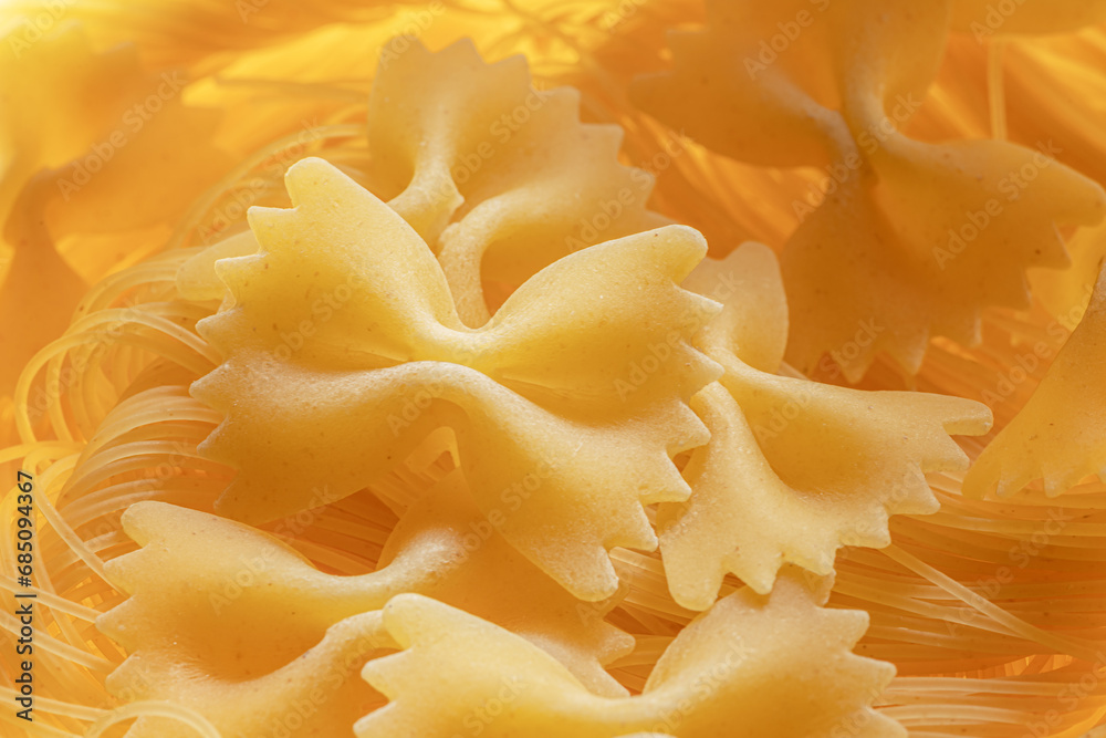 Italian pasta farfalle close-up. Food background. Italian pasta farfalle close-up. Food background.