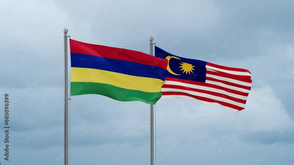 Malaysia and Mauritius flag waving together on cloudy sky, endless seamless loop, two country cooperation concept Malaysia and Mauritius flag waving together on cloudy sky, endless seamless loop, two country cooperation concept
