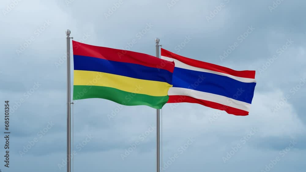 Kingdom of Thailand and Mauritius flag waving together on cloudy sky, endless seamless loop, two country cooperation concept Kingdom of Thailand and Mauritius flag waving together on cloudy sky, endless seamless loop, two country cooperation concept