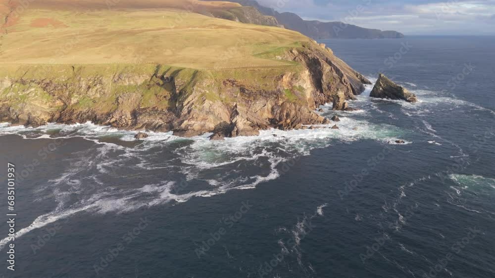 Flyingfrom Malin Beg towards Slieve League cliffs in County Donegal, Ireland Flyingfrom Malin Beg towards Slieve League cliffs in County Donegal, Ireland